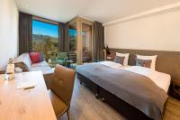 Posteľ alebo postele v izbe v ubytovaní Lifesport Hotel Hechenmoos
