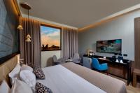 Savhotel Aemilia Bolognaにあるベッド