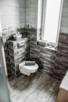 Kúpeľňa v ubytovaní Dióliget Cottage Sárvár