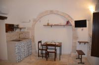 A kitchen or kitchenette at Trulli don Pietro