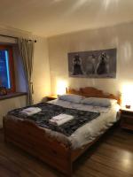 A bed or beds in a room at San Marco FARMHOUSE with a view.