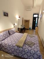 Posteľ alebo postele v izbe v ubytovaní Policlinico Messina Bed&Bed
