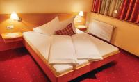 Posteľ alebo postele v izbe v ubytovaní Hotel Gailberghöhe