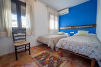 A bed or beds in a room at Apartamentos Montesclaros