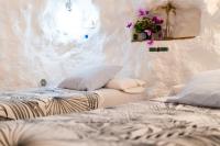 A bed or beds in a room at Apartamentos Montesclaros