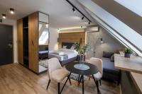 Posteľ alebo postele v izbe v ubytovaní Minaret Residence & Relax Pécs