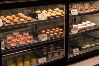 a display case filled with lots of different types of desserts at Evergreen Palace Hotel Chiayi in Taibao