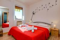 A bed or beds in a room at La Portella - Gardagate