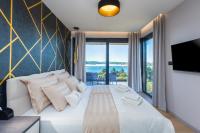 Ein Bett oder Betten in einem Zimmer der Unterkunft Villa Vie