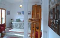 Postel nebo postele na pokoji v ubytování LA CASA DE LOS PINTORES, junto al centro de Granada