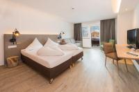 Posteľ alebo postele v izbe v ubytovaní Lifesport Hotel Hechenmoos