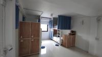 Postel nebo postele na pokoji v ubytování The Rock Samui Poshtel Lamai Beach
