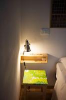 A bed or beds in a room at Albergo delle Spezie