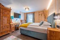 Posteľ alebo postele v izbe v ubytovaní Hotel Jägerheim 3S
