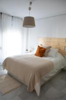 Posteľ alebo postele v izbe v ubytovaní Homely Málaga Larios
