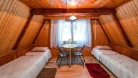 Posteľ alebo postele v izbe v ubytovaní Nova Mazury