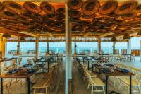 A restaurant or other place to eat at Sunrise Diamond Beach Resort -Grand Select