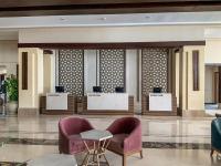 A seating area at Sunrise Diamond Beach Resort -Grand Select