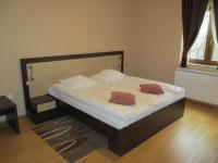 Postel nebo postele na pokoji v ubytování Apartments Manjan