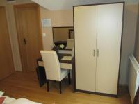 Postel nebo postele na pokoji v ubytování Apartments Manjan