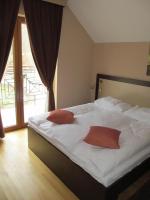 Postel nebo postele na pokoji v ubytování Apartments Manjan