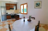 Kuchyň nebo kuchyňský kout v ubytování Holiday Home Blue Dream