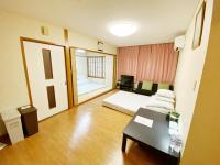 GuestHouse017徳島個室 飲食街中心 阿波踊り会館7分 文理&徳島大学 アスティとくしま車8分にあるベッド