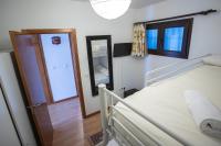 Postel nebo postele na pokoji v ubytování APARTAMENTO IRIS