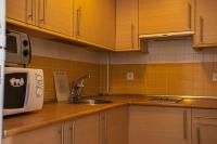 Kuchyň nebo kuchyňský kout v ubytování APARTAMENTO IRIS