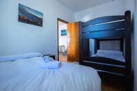 Postel nebo postele na pokoji v ubytování APARTAMENTO IRIS