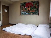 Levite Villa tesisinde bir odada yatak veya yataklar