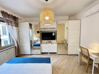 Łóżko lub łóżka w pokoju w obiekcie MilanHolidays