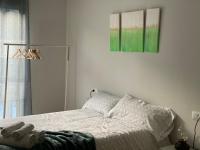 Postel nebo postele na pokoji v ubytování Dúplex Roca del Sucut