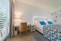 Posteľ alebo postele v izbe v ubytovaní Amadria Park Beach Hotel Jure