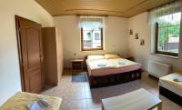 Postel nebo postele na pokoji v ubytování Apartmá Doubek