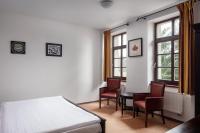 Łóżko lub łóżka w pokoju w obiekcie Hotel Javor