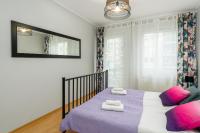 Łóżko lub łóżka w pokoju w obiekcie Sleepway Apartments - Garbary 95-78