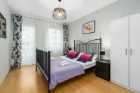 Łóżko lub łóżka w pokoju w obiekcie Sleepway Apartments - Garbary 95-78
