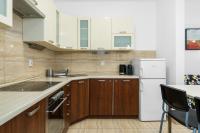 Kuchnia lub aneks kuchenny w obiekcie Sleepway Apartments - Garbary 95-78