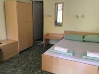 Postel nebo postele na pokoji v ubytování Nimpha Bungalows