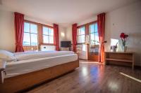 Posteľ alebo postele v izbe v ubytovaní Alpino Lodge Bivio