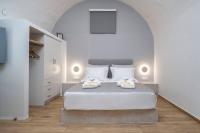 Postel nebo postele na pokoji v ubytování Casa Tholari Al Mare
