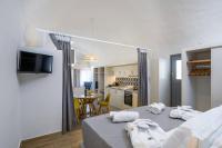 Postel nebo postele na pokoji v ubytování Casa Tholari Al Mare