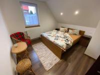A bed or beds in a room at Privat Greta