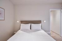 Posteľ alebo postele v izbe v ubytovaní Charitos IΧ, Chic n modern 2BD Apt