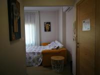 Posteľ alebo postele v izbe v ubytovaní Apartamentos Playa Compostela