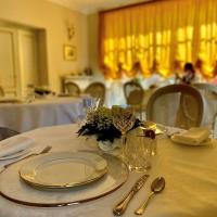 Reštaurácia alebo iné gastronomické zariadenie v ubytovaní Principessa di Savoia