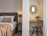 Ein Bett oder Betten in einem Zimmer der Unterkunft Astarte Villas - Onda Beach Villa