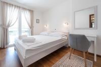 Postel nebo postele na pokoji v ubytování Apartment Maro Bayview