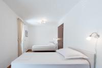 Postel nebo postele na pokoji v ubytování Apartment Maro Bayview